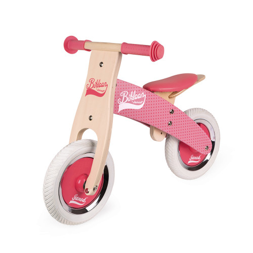 pink wooden balance bike